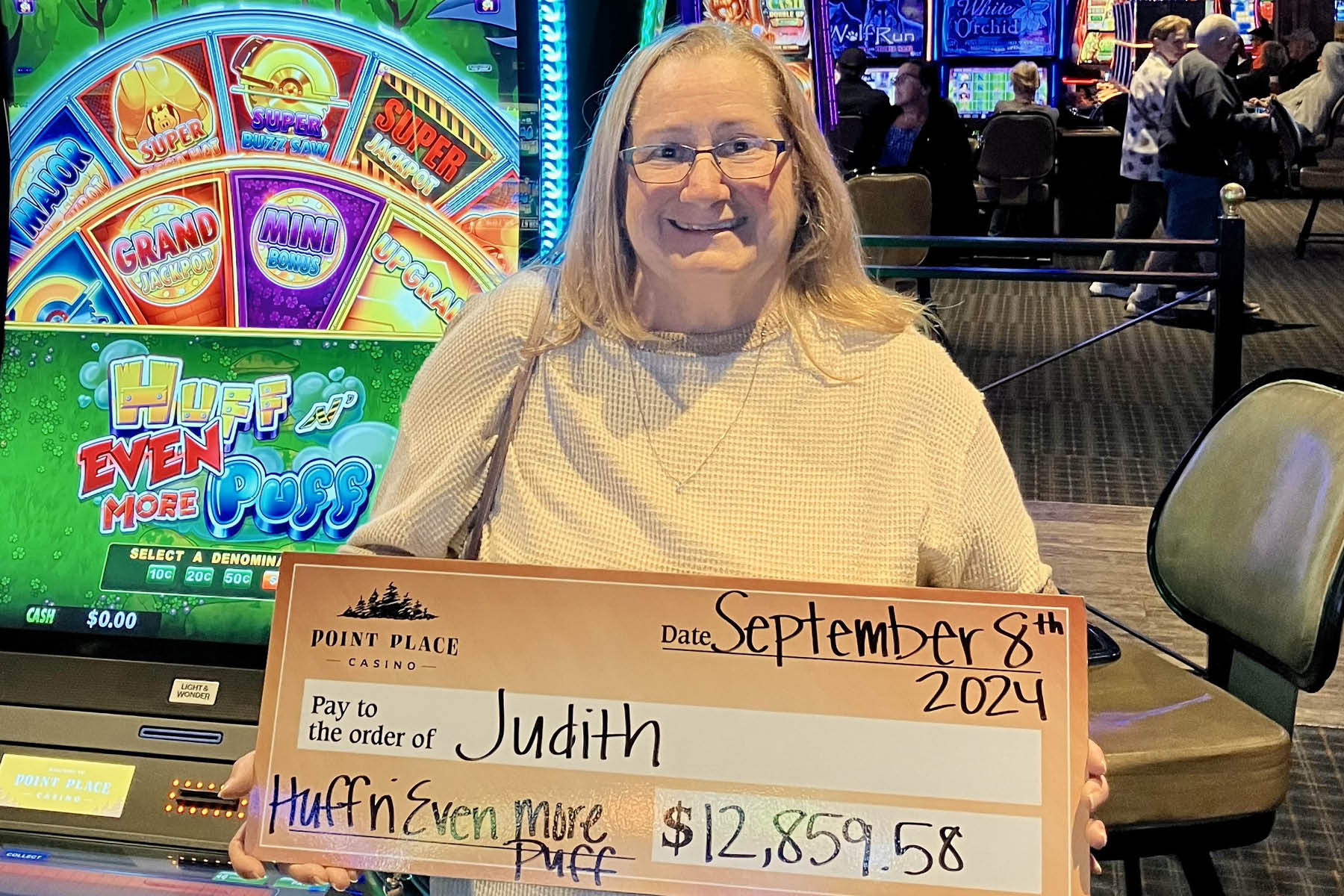 Judith won $12,859